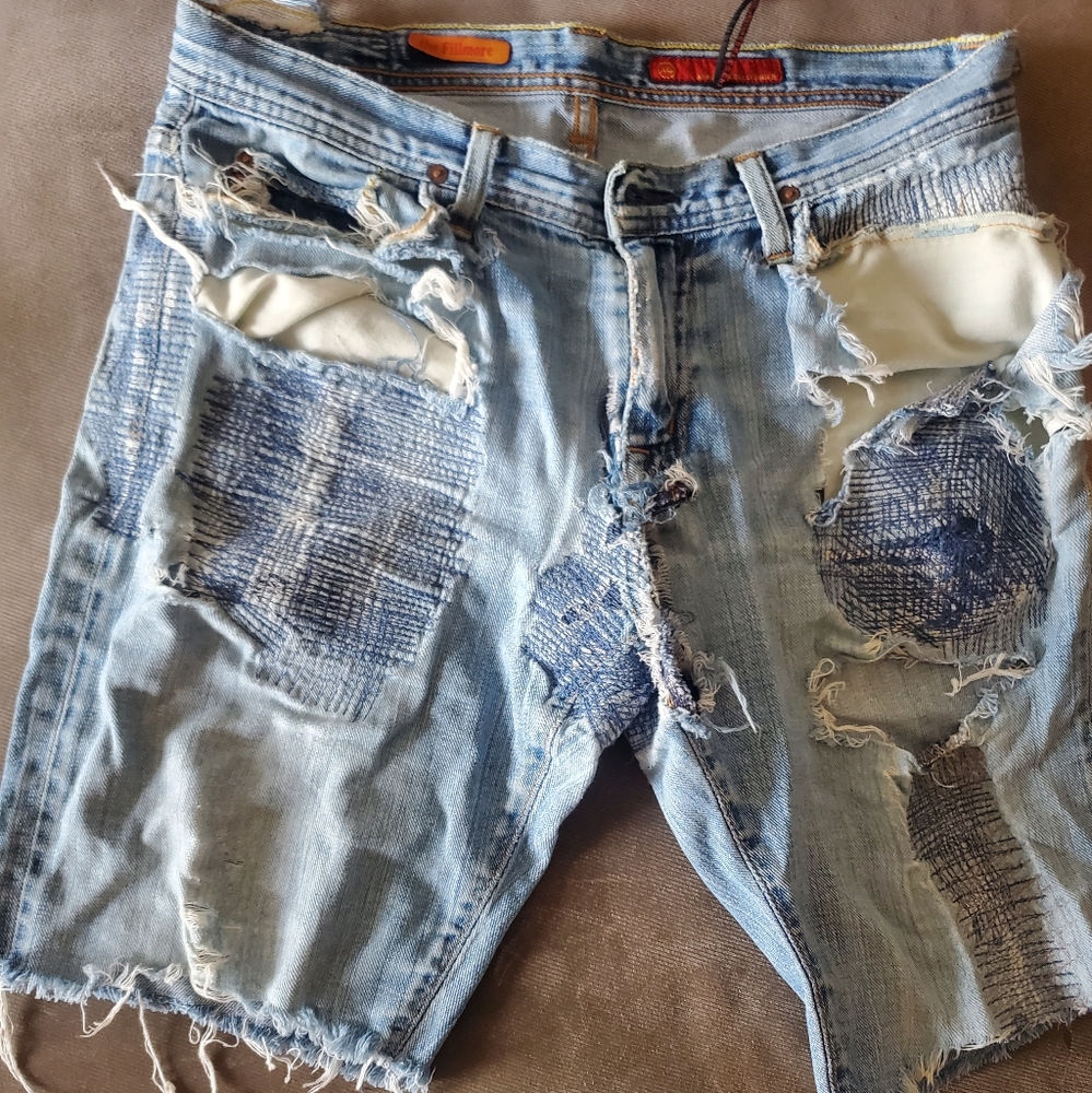 AG Adriano Goldschmied ripped shorts.